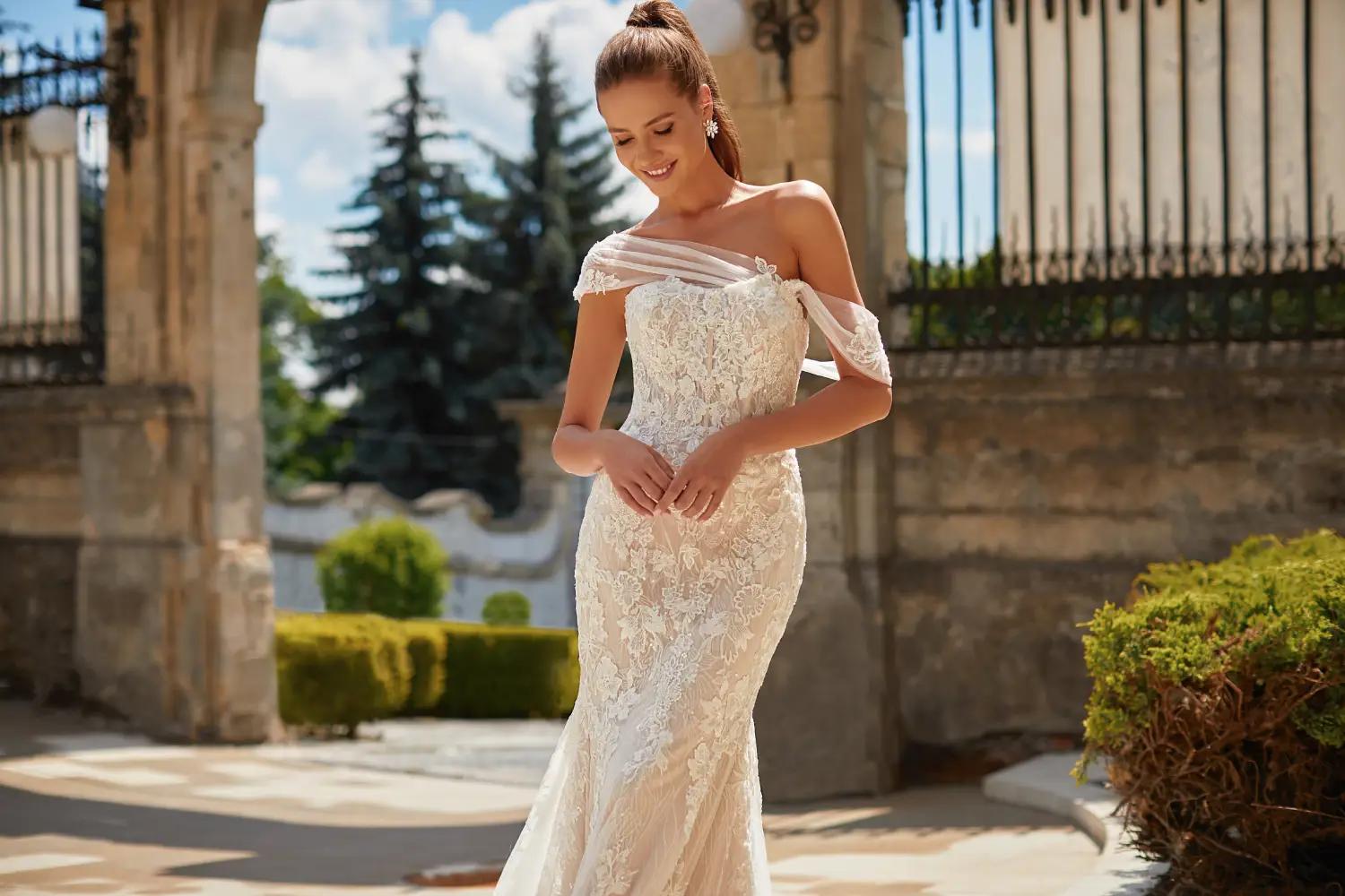 Model wearing Simply Val Stefani wedding dress