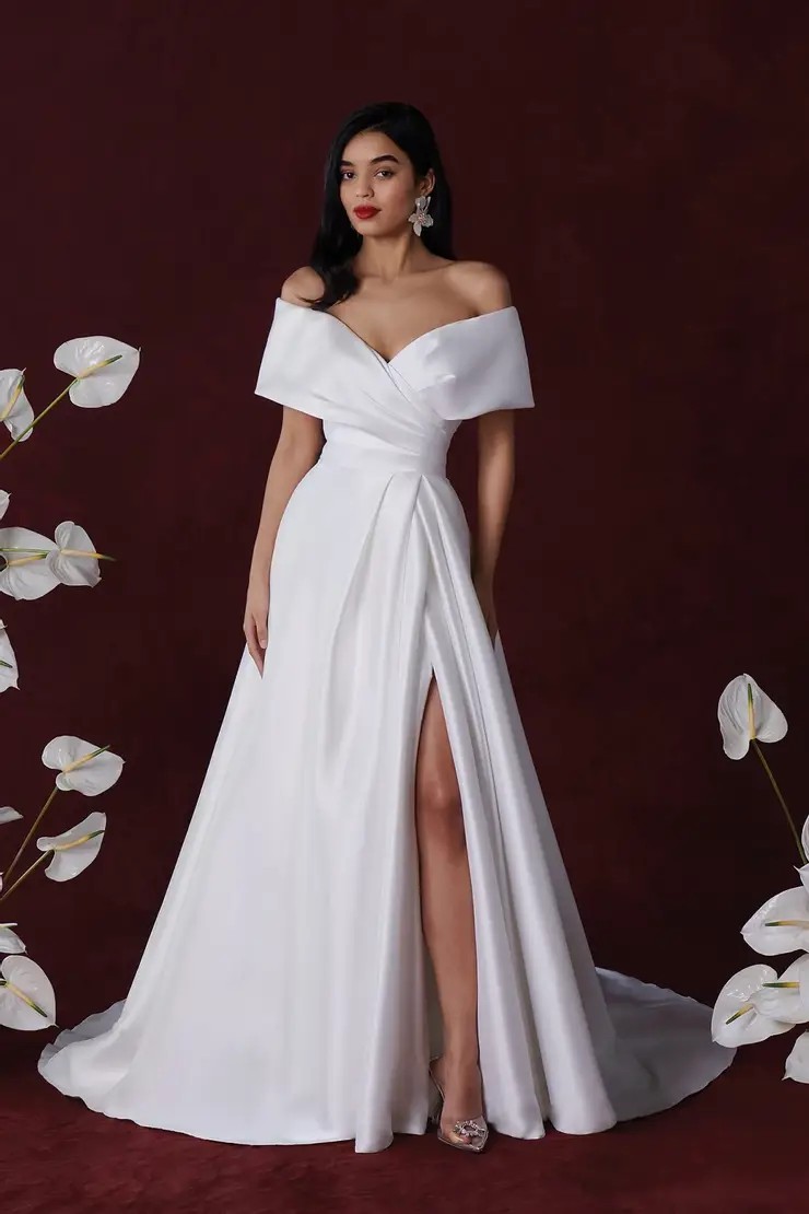 Model wearing a white gown