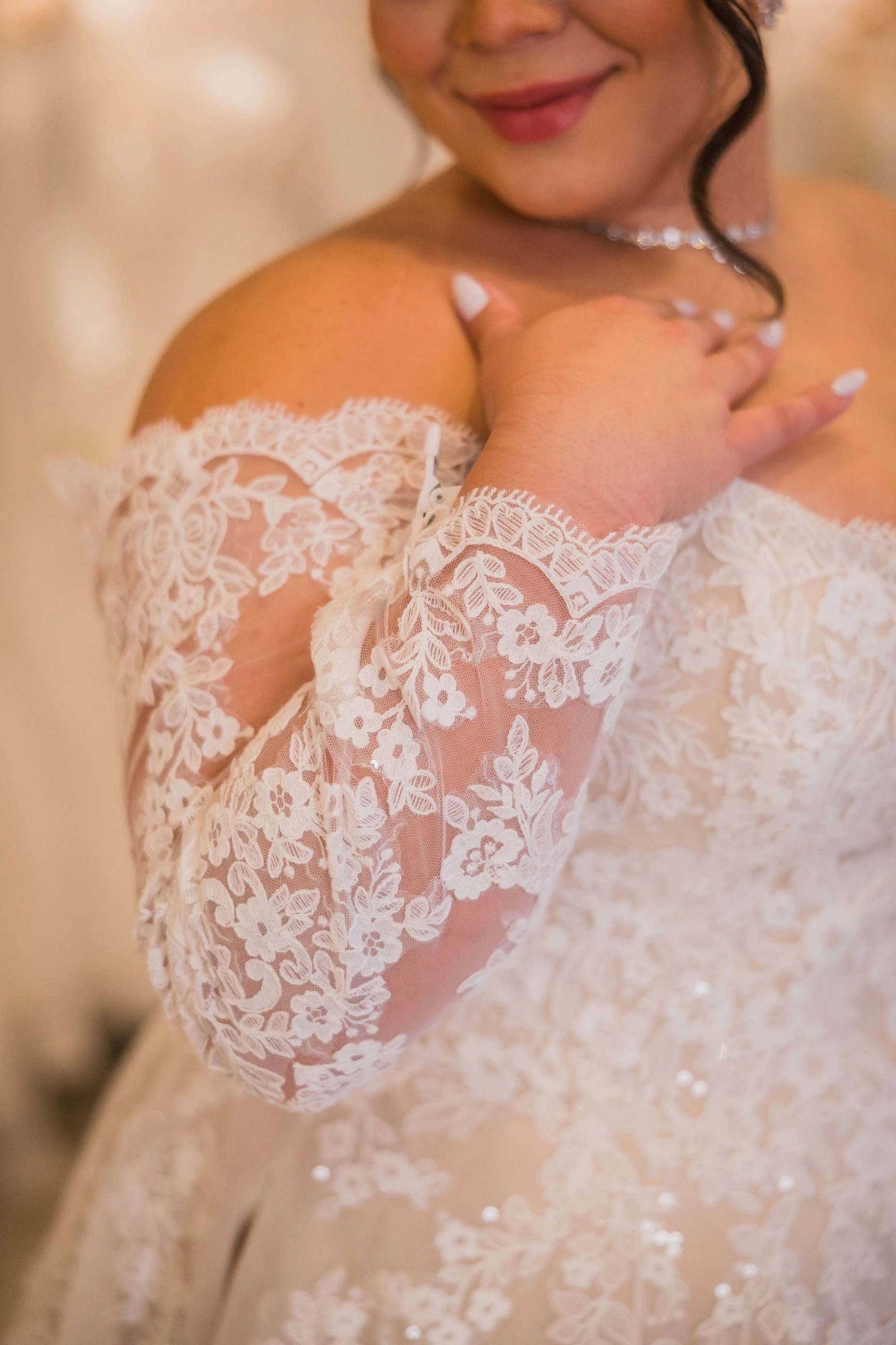 close up of bride in her wedding dress