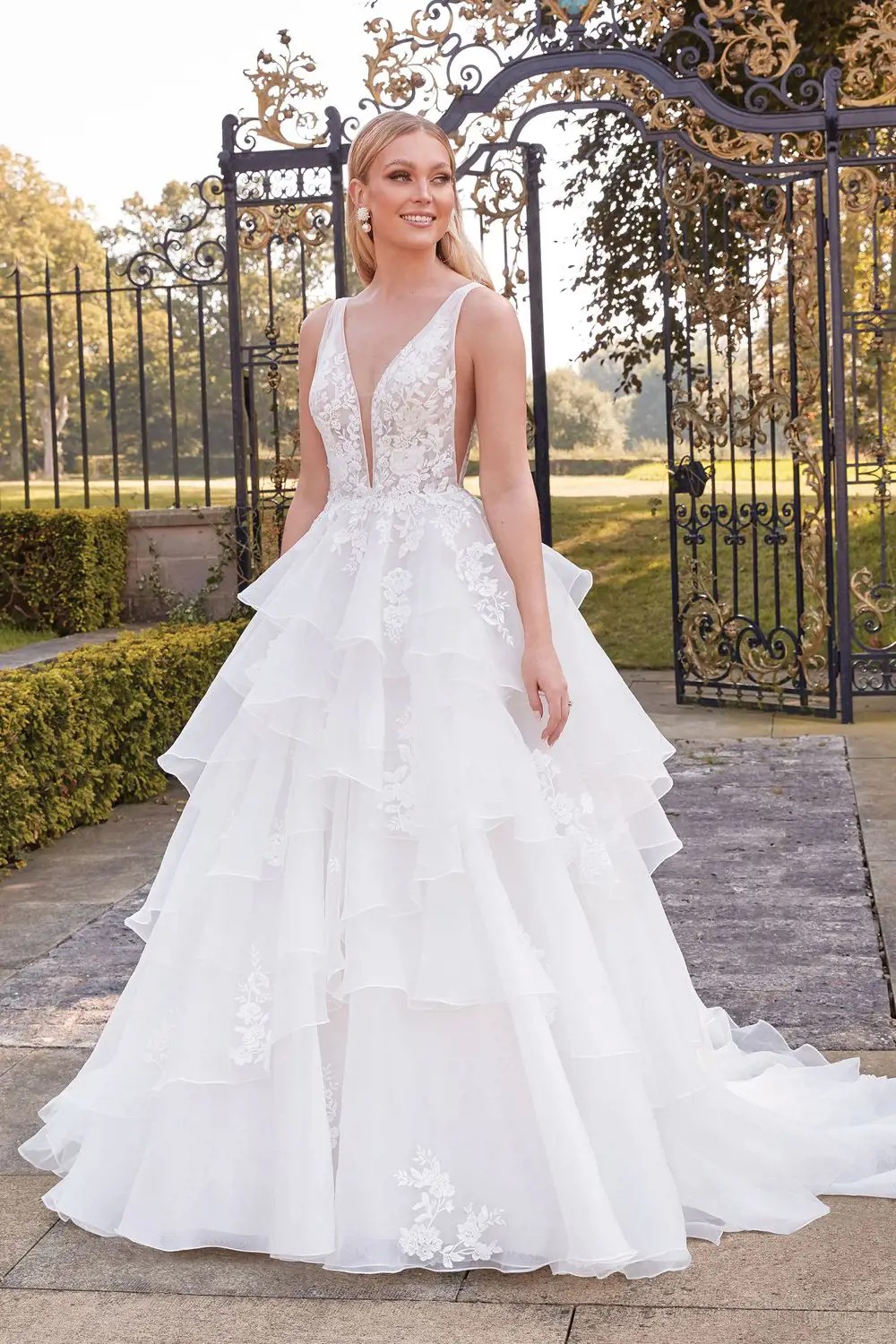 Model wearing a white gown