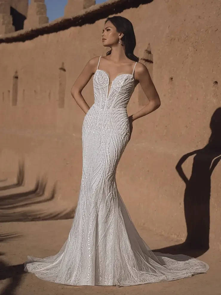 Model wearing Blue by Enzoani wedding dress