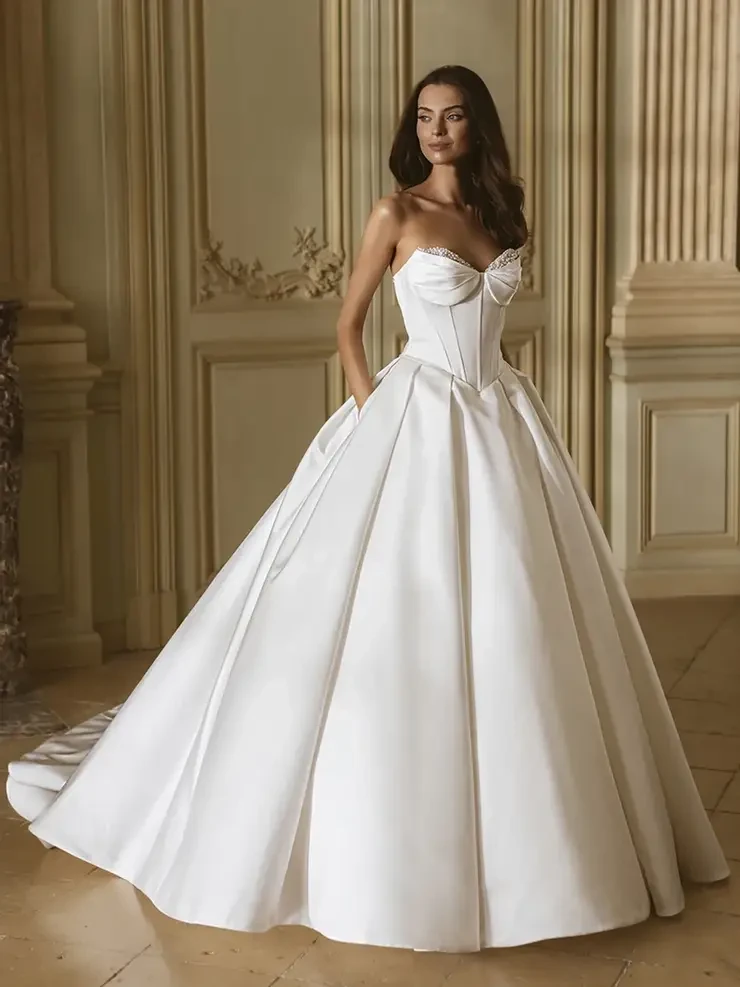Model wearing Elysee wedding dress