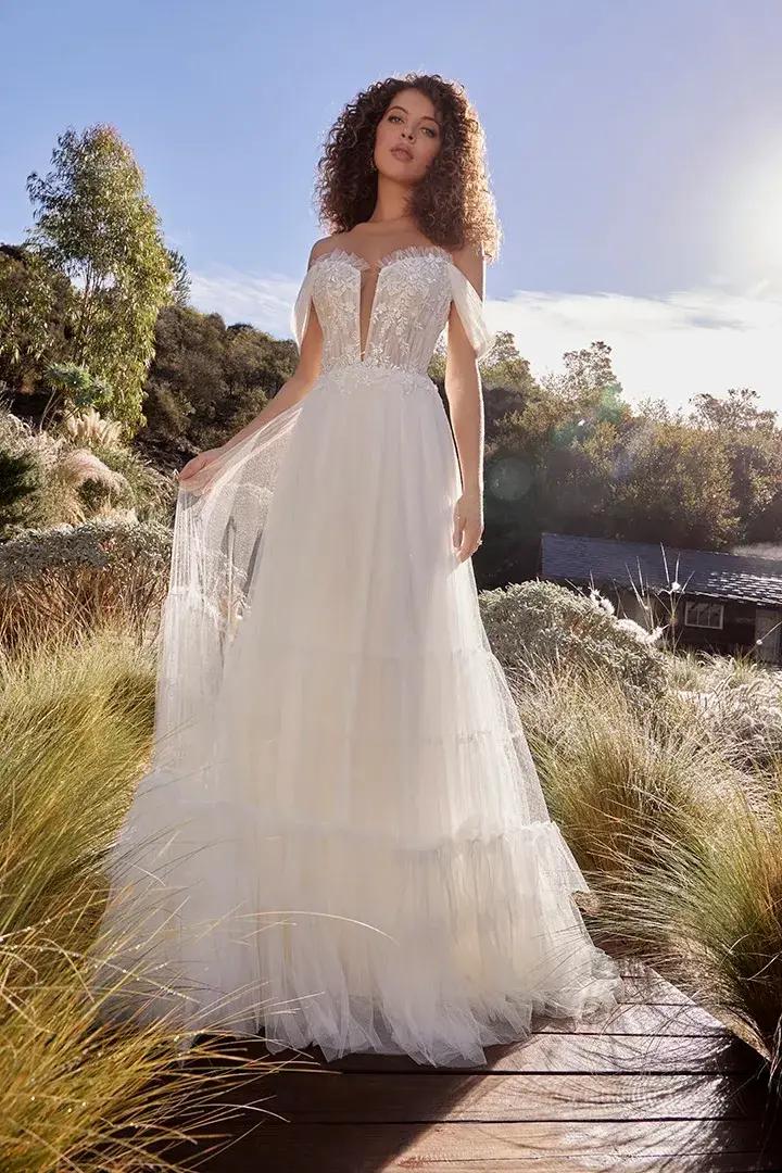 Model wearing beloved by casablanca wedding dress
