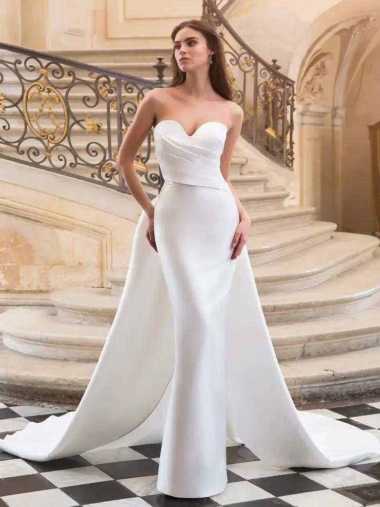 Model wearing Elysee wedding dress