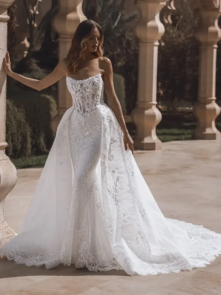 Model wearing Enzoani wedding dress