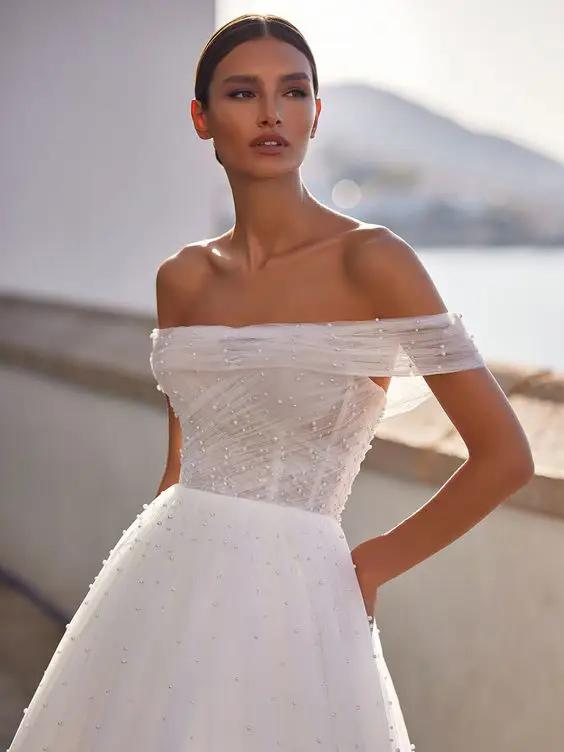 Model wearing Moonlight Tango wedding dress