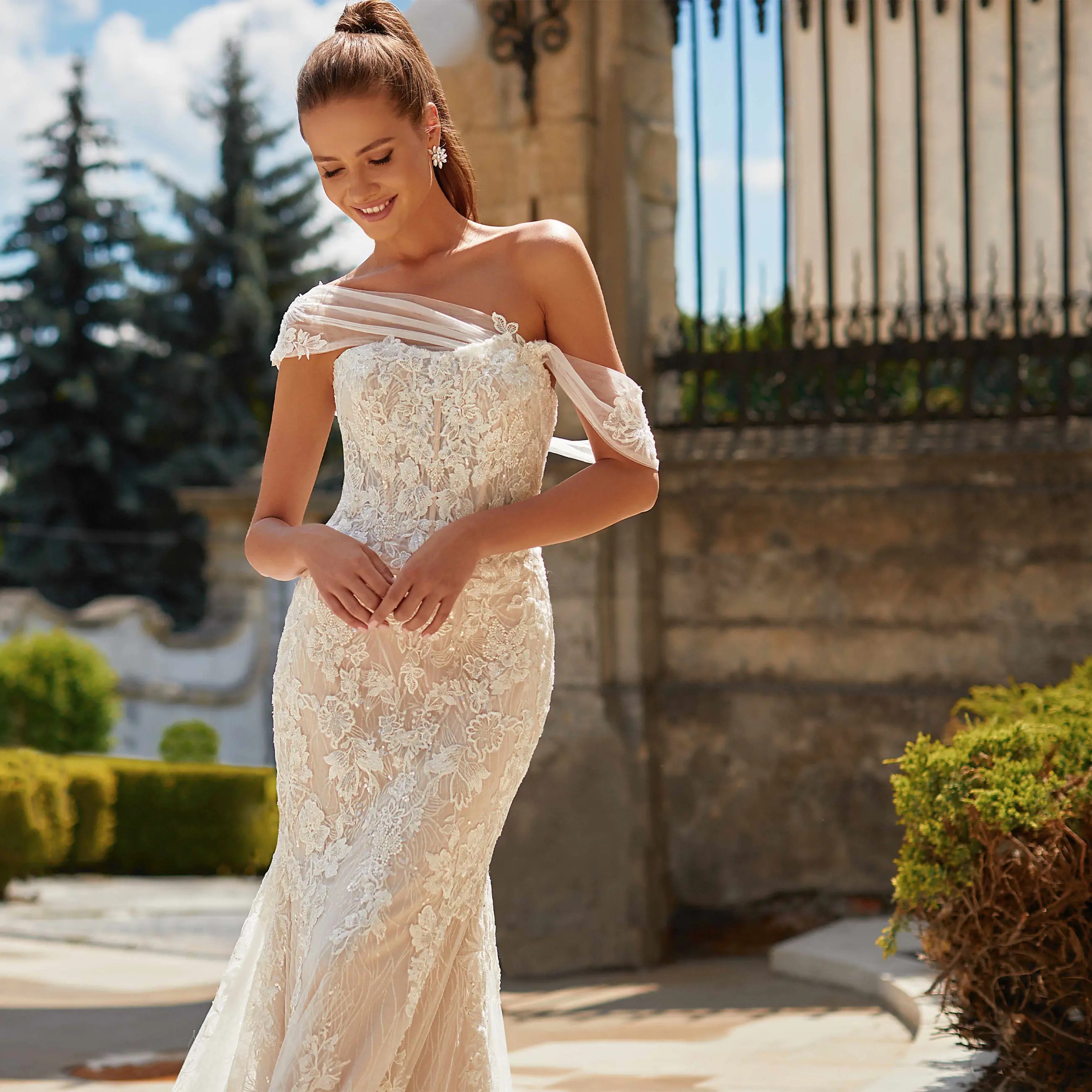 Val Stefani wedding dresses at White House Bridal. Model wearing Val Stefani wedding dress.